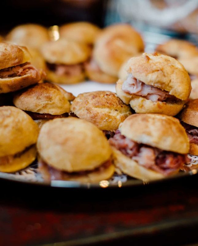 catered sliders with meat on a bun