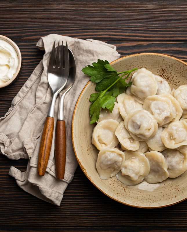 Pelmeni, traditional dish of Russian cuisine, boiled dumplings with minced meat