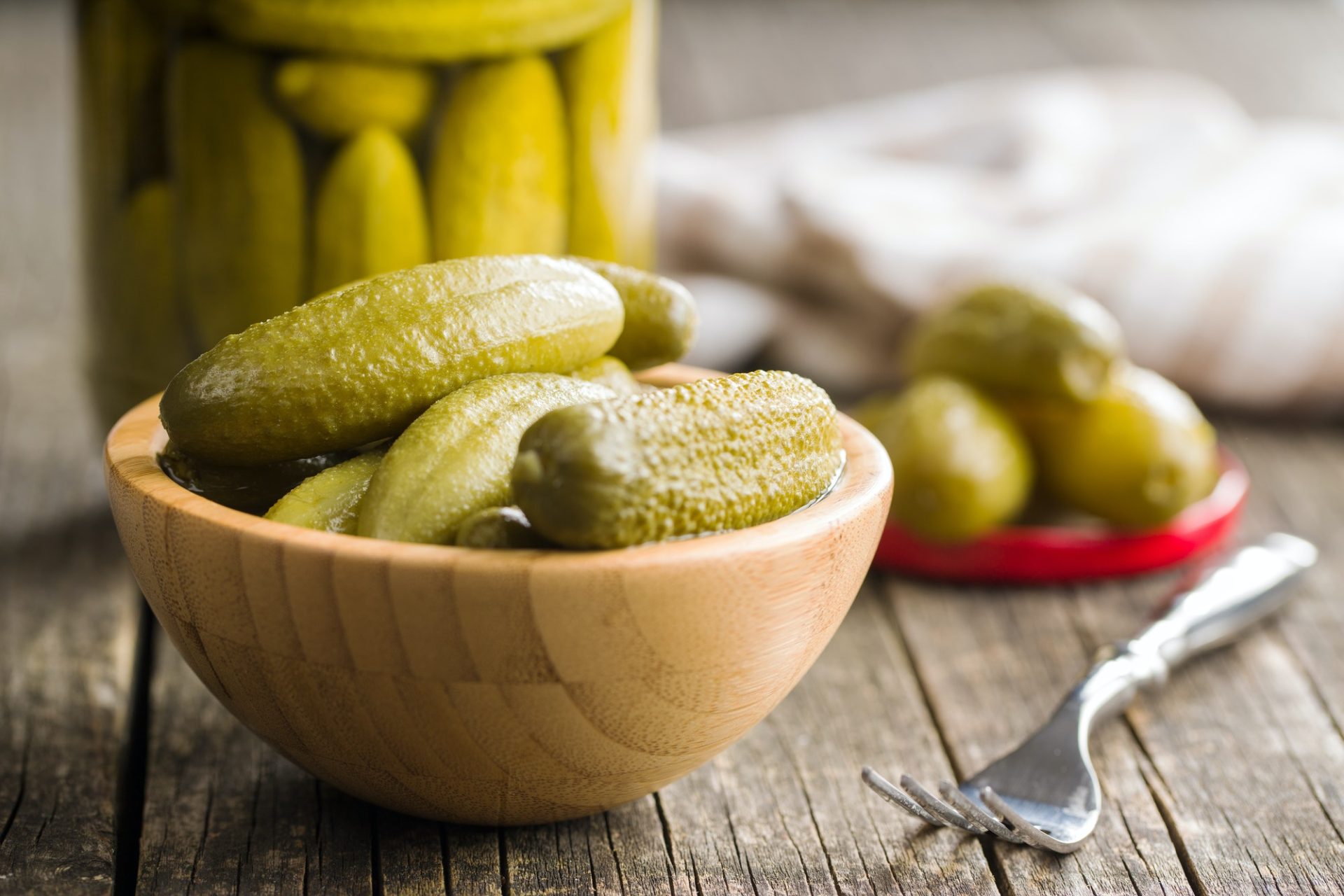 Pickles in bowl. Preserved cucumbers.