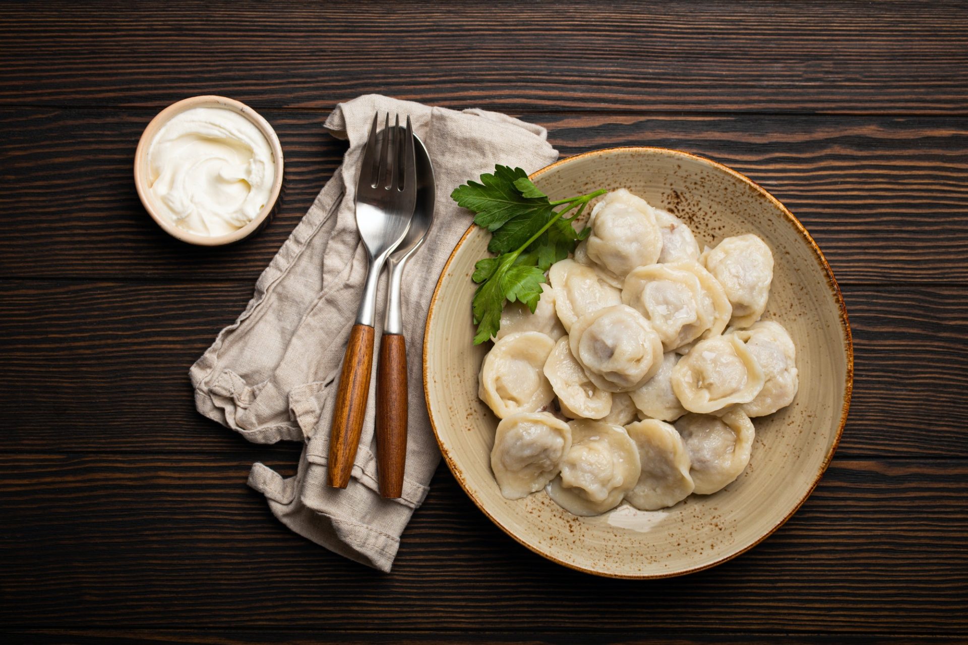 Pelmeni, traditional dish of Russian cuisine, boiled dumplings with minced meat