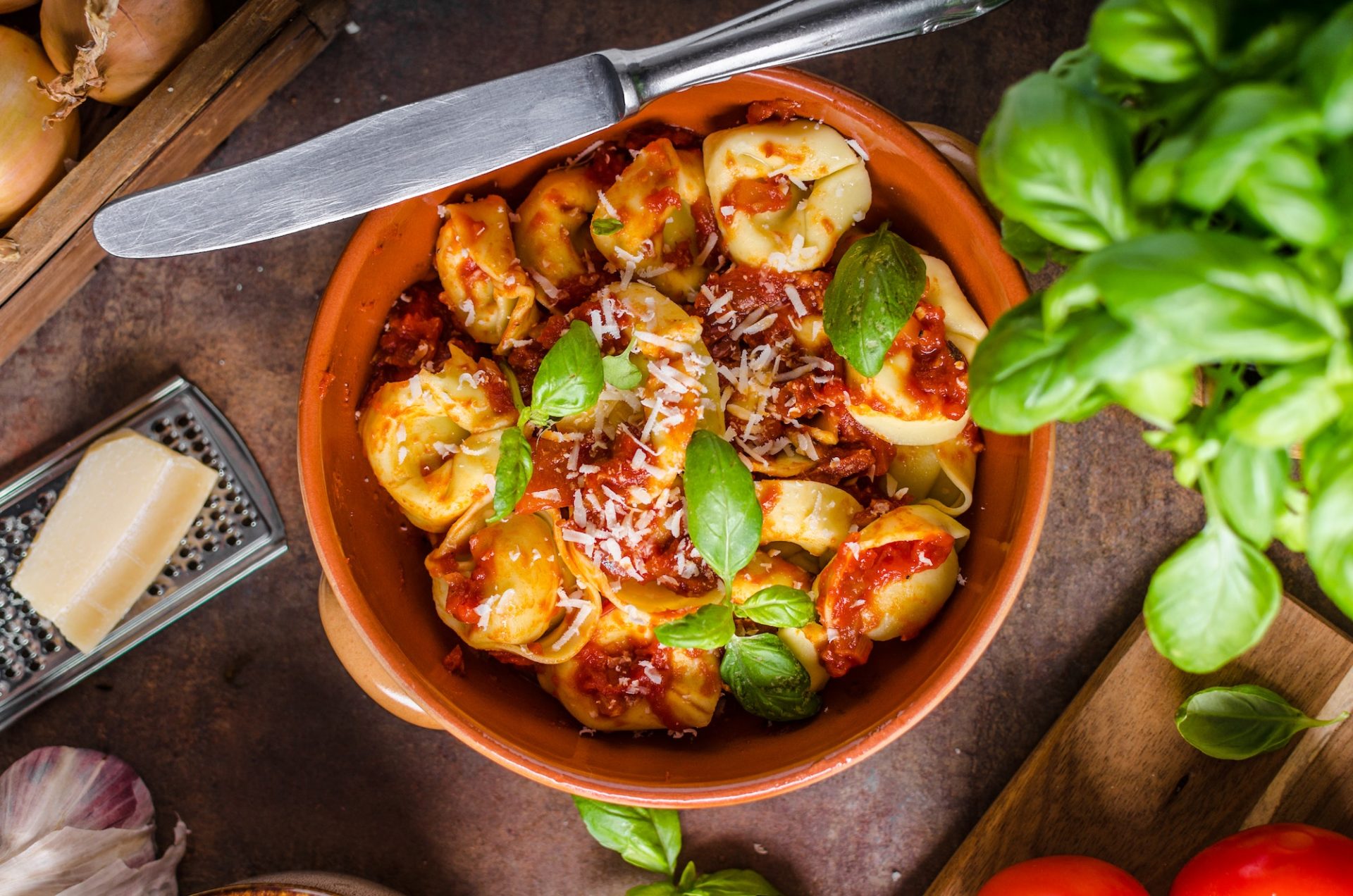 Homemade tortellini with tomato sauce